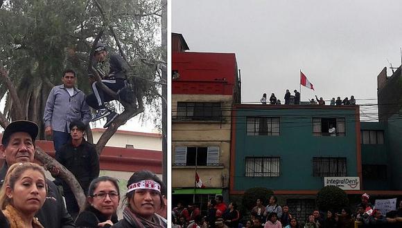 ​Fiestas Patrias: público trepa árboles y abarrota azoteas para ver desfile militar (FOTOS y VIDEO)