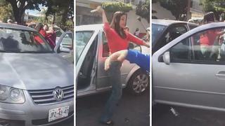 Familia se demora en cruzar la calle y conductora los agarra a golpes (VIDEO)