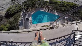 YouTube: Hombre se lanza a piscina desde quinto piso y lo registra en video 