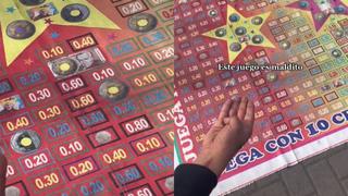 Gana miles de soles con negocio callejero de “juego de monedas” e impresiona a todos