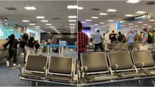 ¡De película! pasajeros protagonizan una pelea en el Aeropuerto Internacional de Miami | VIDEO