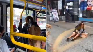 Mujer le escupe en la cara a un hombre y este la empuja fuera del bus en el que viajan 