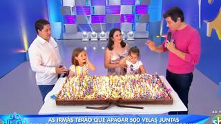 Hermanas del cumpleaños viral reaparecen en TV y compiten para apagar 500 velas