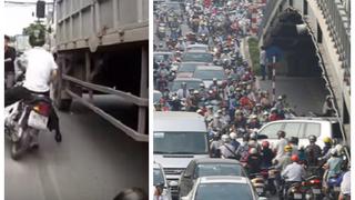 Cae desde su moto en plena avenida transitada y salva de morir (FOTOS Y VIDEO) 