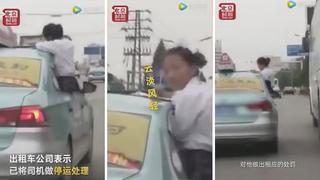 Niña hace su tarea en el techo de un taxi en movimiento (VIDEO)