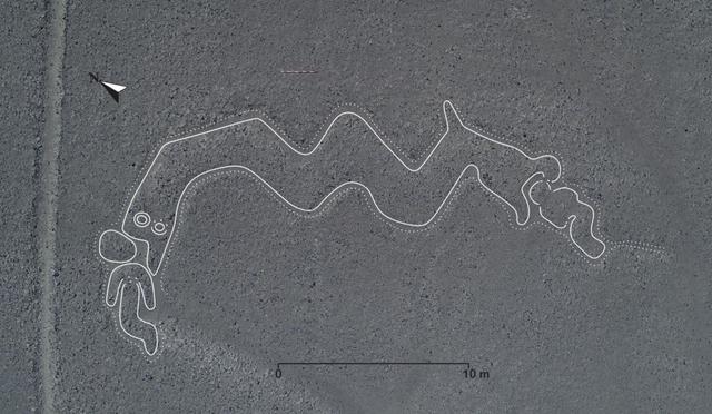 Una serpiente de dos cabezas y una figura humanoide. (Foto: Universidad de Yamagata)