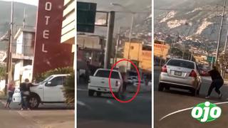 Descubre infidelidad de su esposo y antes de que escape saliendo de hotel, se cuelga de su camioneta | VIDEO