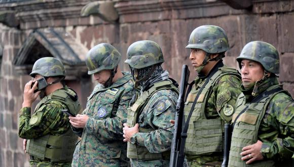 Las fuerzas de seguridad hacen guardia frente al Palacio de Carondelet en Quito, Ecuador, el 10 de enero de 2024. (Foto de STRINGER / AFP).