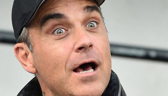 Robbie Williams escapa de edificio en llamas