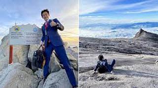 Sastre japonés escala montaña de 4100 metros con terno, corbata y zapatos de vestir | VIDEO