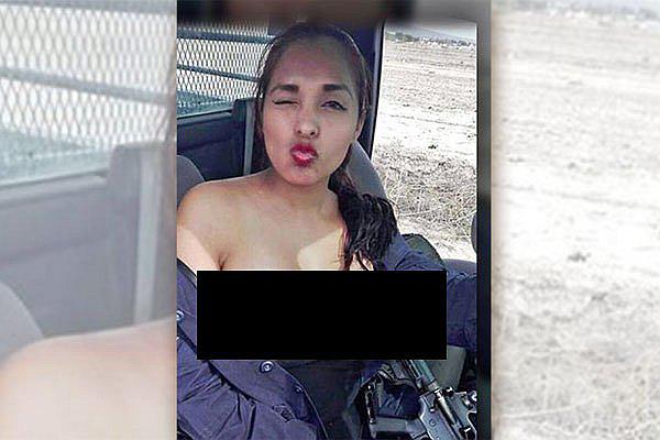 Facebook: Mujer policía posa feliz en topless y la suspenden      