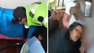 Mujer saca a correazos a joven que se había escondido bajo cama de su hija | VIDEO