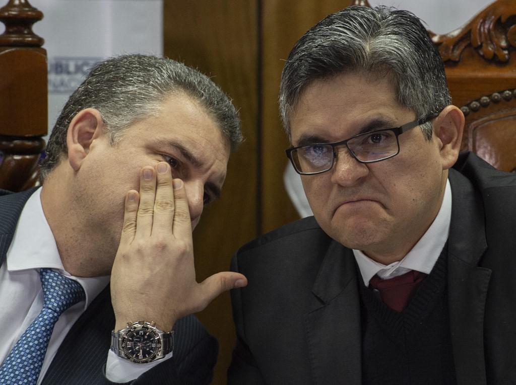 Peruvian prosecutors Rafael Vela (L) and Jose Domingo Perez attend a press conference in Lima on June 20, 2019. - The Peruvian justice gave the green light to a compensated collaboration agreement signed between the Peruvian prosecutotion office and the Brazilian construction company Odebrecht, protagonist of a mega-scandal of corruption that splashes four Peruvian presidents. (Photo by Cris BOURONCLE / AFP)