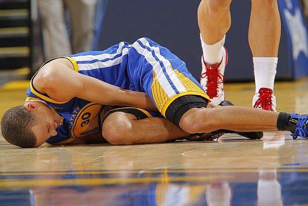 NBA: Stephen Curry sigue lesionado, pero Warriors están calmados