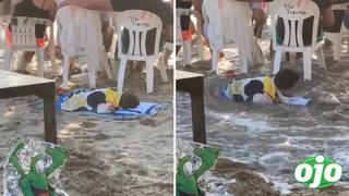 Viral: Padres olvidan a su bebé dormido en la orilla de una playa y es despertado por una ola