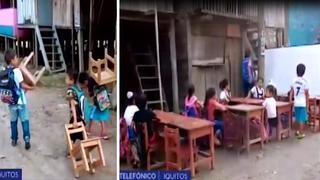 Niños cargan sus carpetas y estudian en la calle en medio del barro porque su colegio colapsó │VIDEO