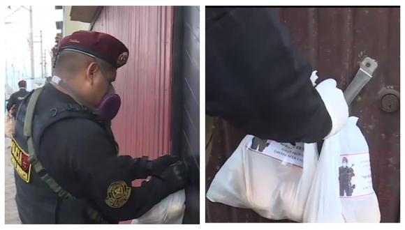 Agentes policiales del Callao regalan pan a vecinos de zonas pobres durante cuarentena por coronavirus. (Captura: América Noticias)