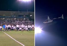 Dueño de equipo de fútbol arroja 10 mil dólares en billetes desde helicóptero como regalo a hinchas | VIDEO