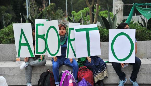 Activists supporting the decriminalization of abortion take part in a political and cultural activity "For the right to decide on our bodies" on the International Safe Abortion Day on September 28, 2019, in Mexico City. (Photo by CLAUDIO CRUZ / AFP)