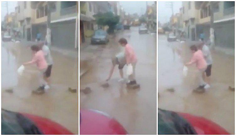 ¡Amor del bueno! Abuelito ayuda así a su esposa a cruzar calle afectada por el huaico (VIDEO)