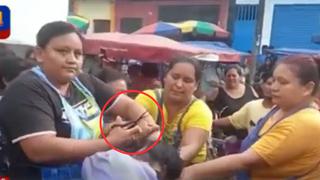 Iquitos: le cortan el cabello a mujer por intentar estafar con S/100 falsos a vendedora de pollo | VIDEO 