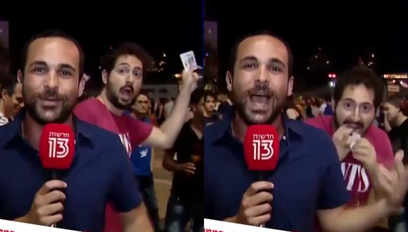 Un video viral muestra el improsivado acto de magia de un espontáneo durante un reporte en vivo de un noticiero israelí. | Crédito: u/nahoy9595 / Reddit