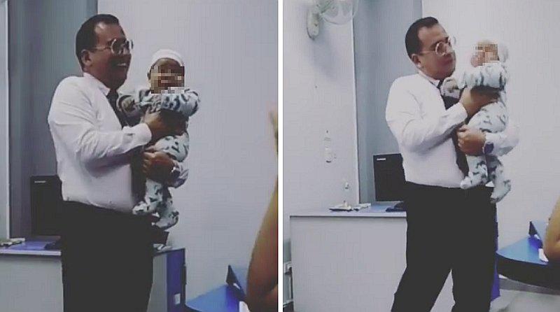 Profesor carga a bebé para que su alumna pueda dar su examen (VIDEO)