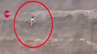 San Miguel: Hombre arriesga su vida al trepar geomallas de acantilado en la Costa Verde | VIDEO