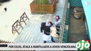 Mujer agrede a extranjera con un martillo tras esperarla en la calle | VIDEO