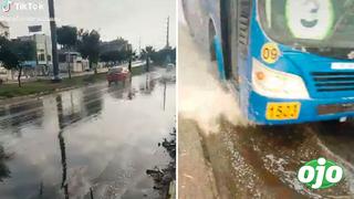 Joven graba los charcos que dejó la lluvia en Lima, pero bus aparece y la moja de pies a cabeza 