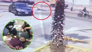 Delincuente herido de bala cae de moto tras robar a peatón que salió de banco (VIDEOS)