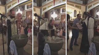 Sacerdote causa polémica por violento bautizo a bebé (VIDEO)