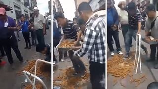 Vendedor de churros pisa su mercadería para no entregarlo a los inspectores | VIDEO 