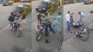 Ladrón intenta robar cartera en su moto y termina en el piso tras recibir una fuerte cachetada