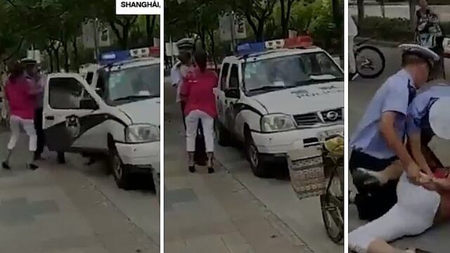 Facebook: policía de Shanghái agrede brutalmente a mujer con su bebé en brazos (VIDEO)