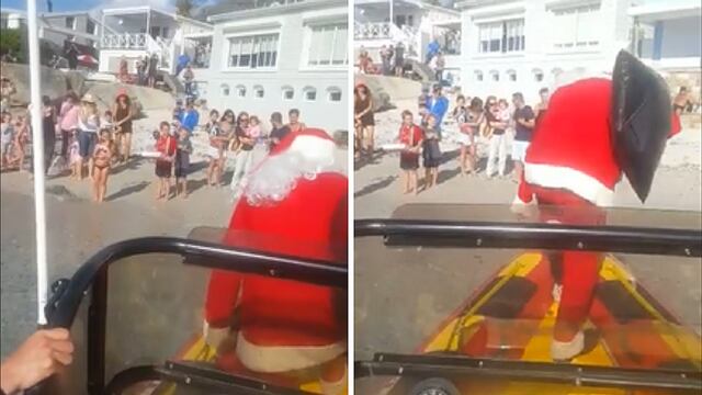 Papá Noel baja de un barco para entregar regalos a niños, pero sufre aparatoso accidente (VDIEO)