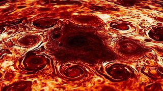 ​Sonda capta imágenes de ciclones gigantes en polo norte de Júpiter