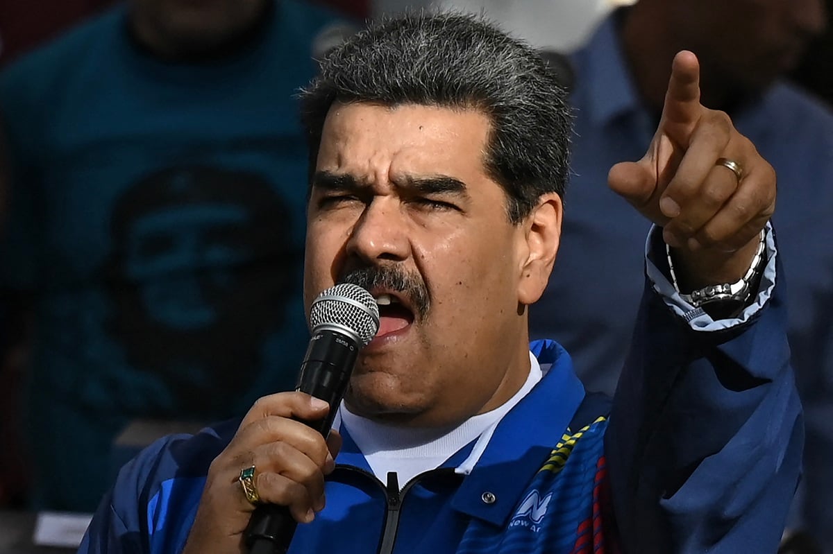Nicolás Maduro aseguró que ha trabajado en una “misión especial” para auxiliar a los venezolanos en el exterior. (Foto: Federico PARRA / AFP)