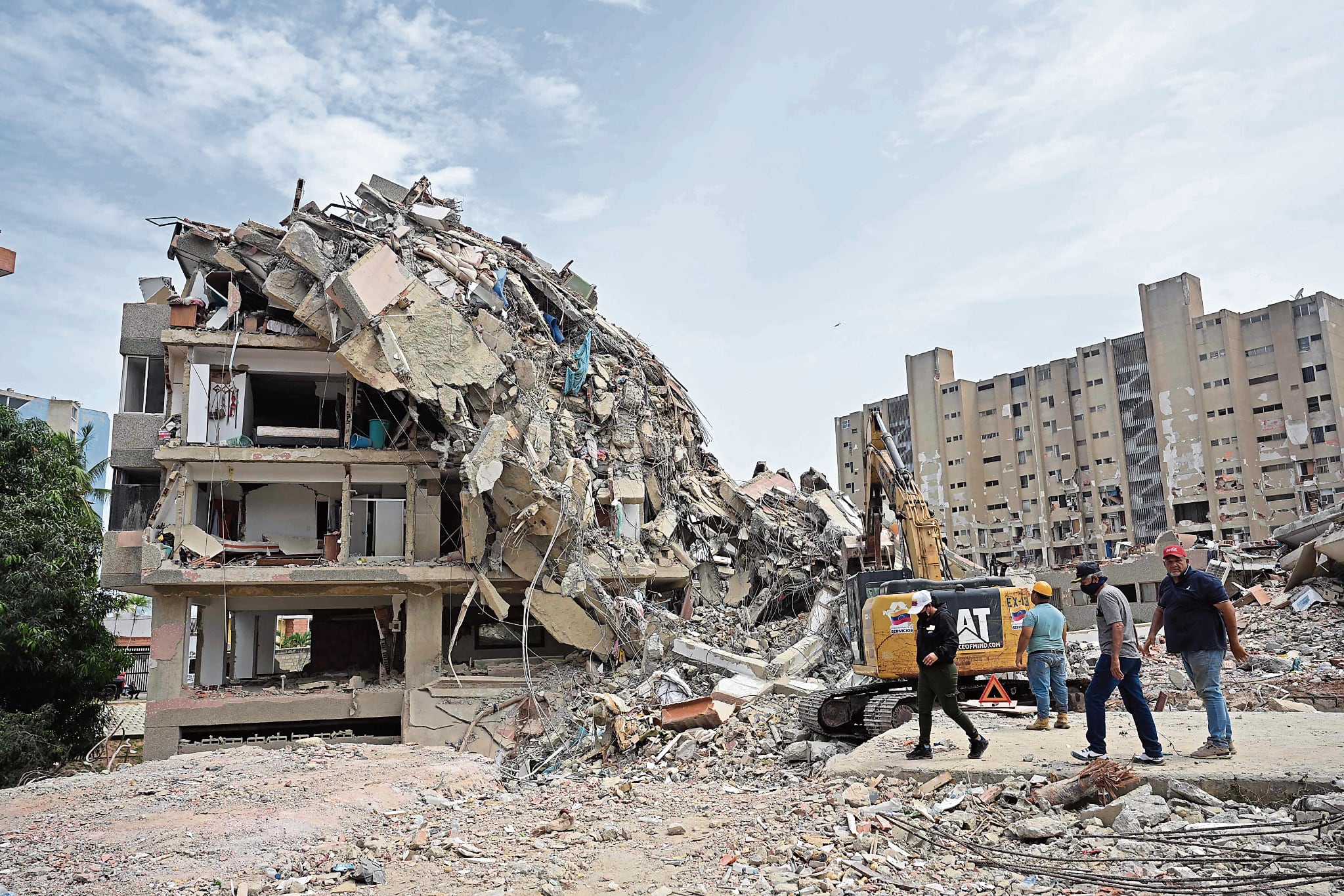 Venezolanos sufren por los devastadores terremotos que han causa muerte y destrucción. (Photo by MARTIN BERNETTI / AFP)