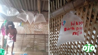 Niños de bajos recursos utilizan bolsas plásticas como globos para celebrar el cumpleaños de su padre