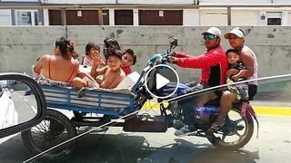 Familia pasea en triciclo motorizado por la Vía Expresa y causa indignación en Facebook (VIDEO)