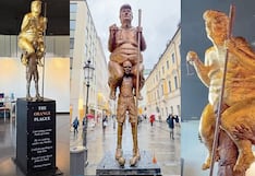 Parlamento europeo exhibe a estatua de Donald Trump calato y con un palo de golf