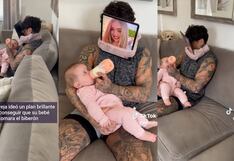Padre de familia inventa una particular forma para que su bebé tome su biberón