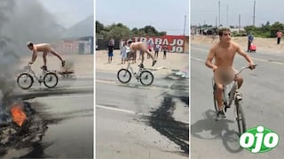Manifestante se roba el show y protesta desnudo encima de una bicicleta | VIDEO