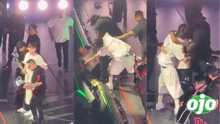 Guardaespaldas de ‘Peso Pluma’ taclea a fanático durante concierto y reacción del cantante sorprende