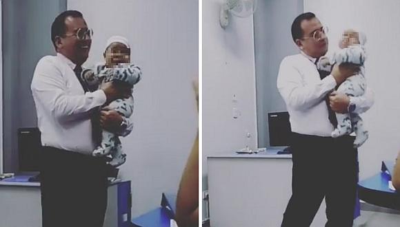 Profesor carga a bebé para que su alumna pueda dar su examen (VIDEO)